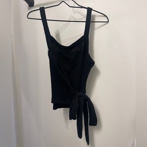 Black knit top with cute tie bow detail